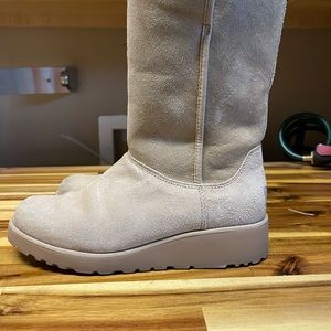 UGG wedge boots. Like new. Size 7. Color sand. Only worn twice with socks.